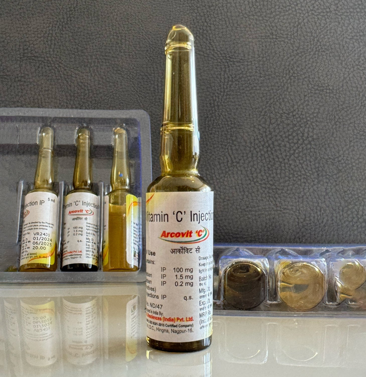 Vitamin C Injections Ascorbic Acid 500mg/mL - Orange and brown unopened bottle containing vitamin c with white background.