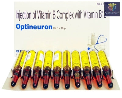 A white box of Vitamin B Complex and ten red and yellow ampoules are arranged on a white table.